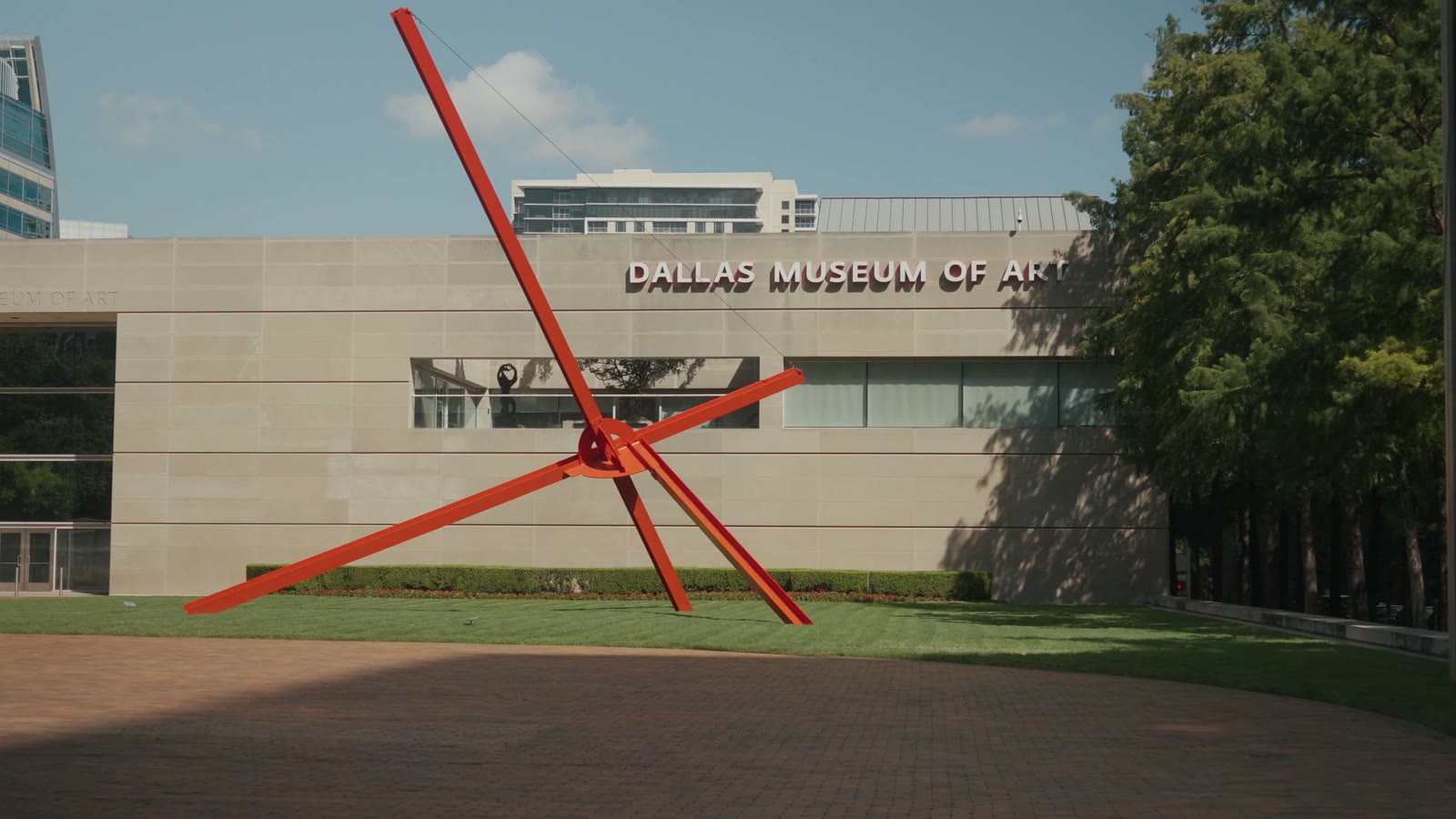 Red steel sculpture in front of the Dallas Museum of Art, from the GDPC story film